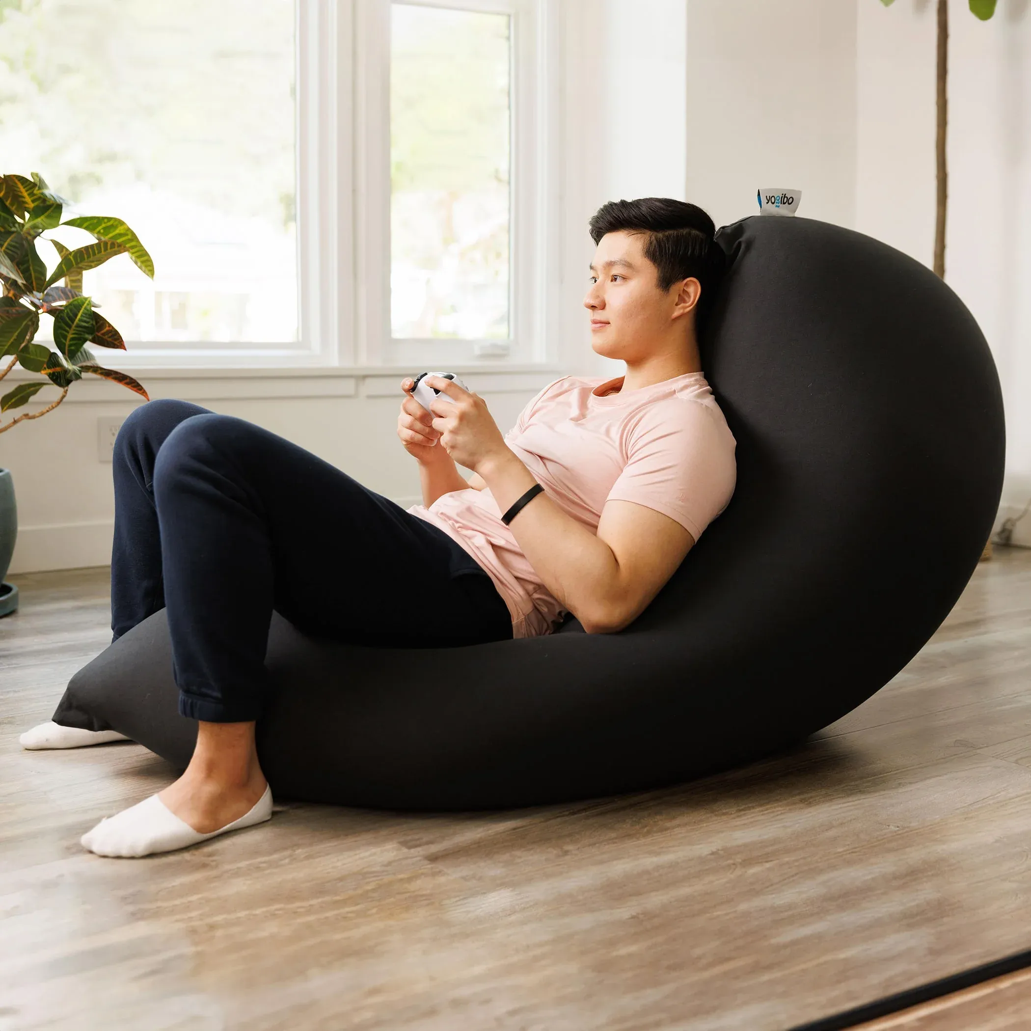 Yogibo Max bean bag chair shaped into a recliner