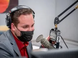 Zach Taglioli behind the mic