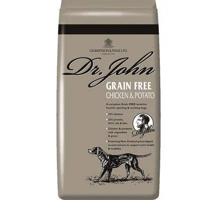 A bowl of Dr John Grain-Free Chicken and Potato dog food with vegetables and gravy.
