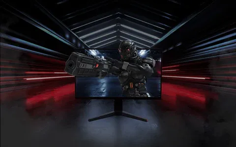 A gaming monitor on a desk.