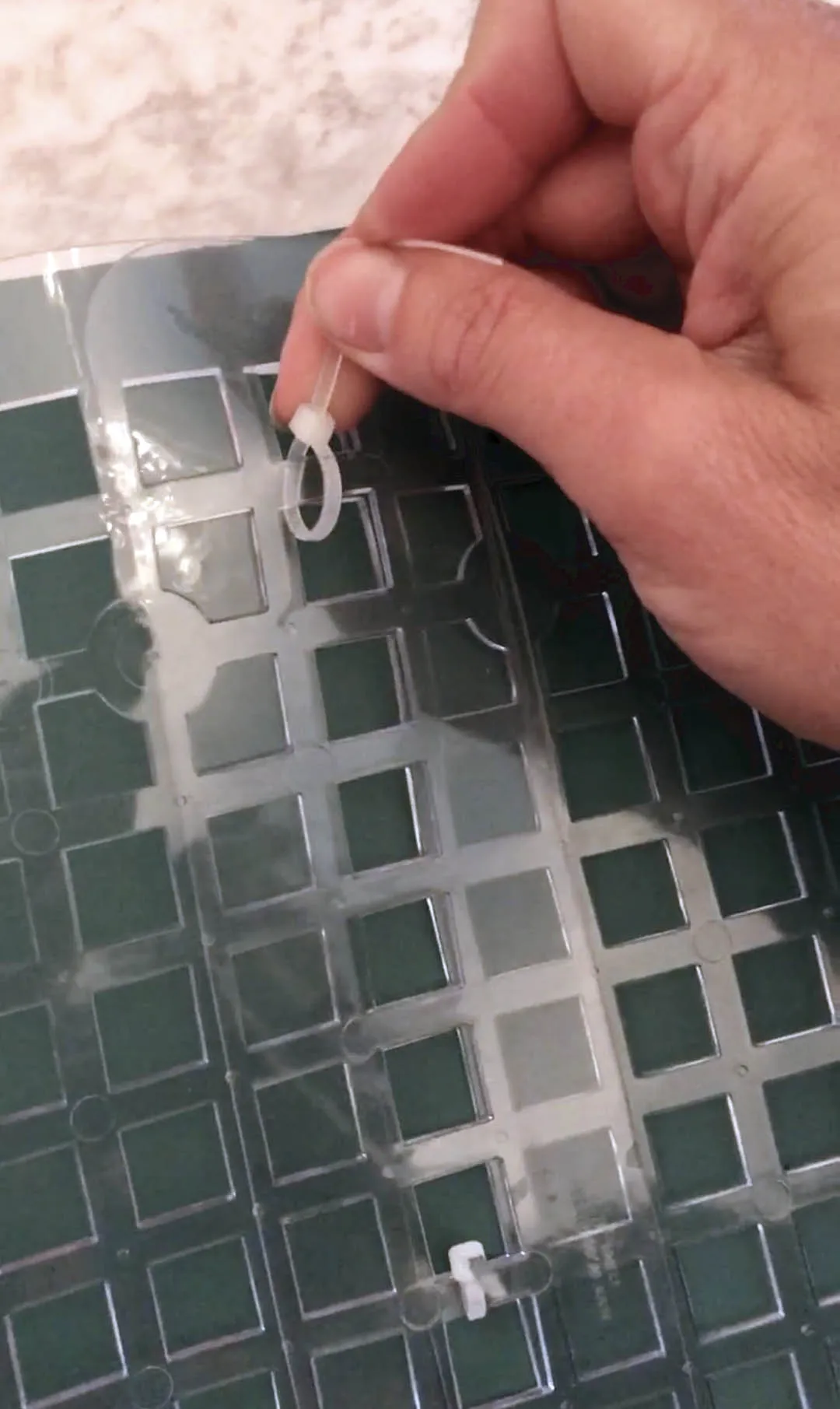 Connecting two sink mats to create a larger snuffle mat