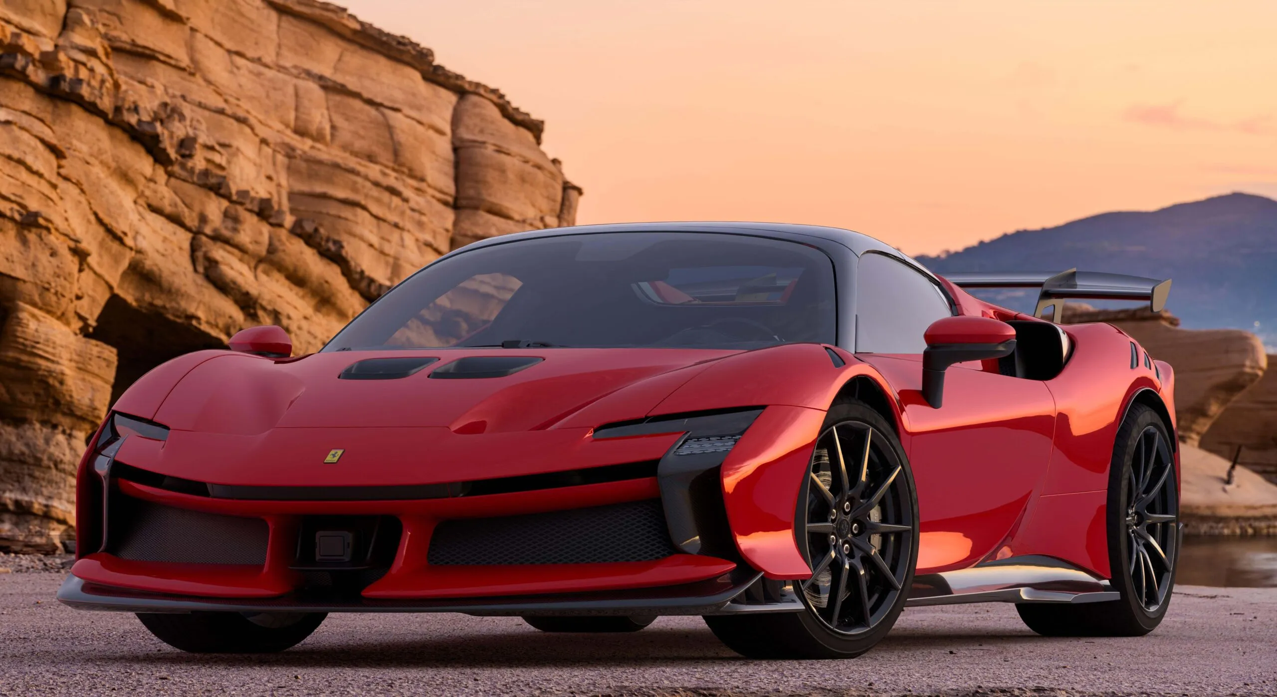 Ferrari sports car in motion, highlighting its aerodynamic lines