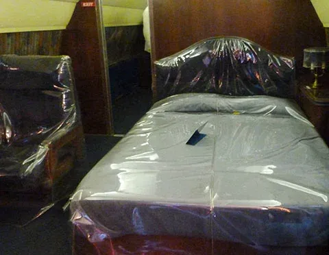 Inside the 'Lisa Marie' plane, showcasing Elvis's private bedroom.