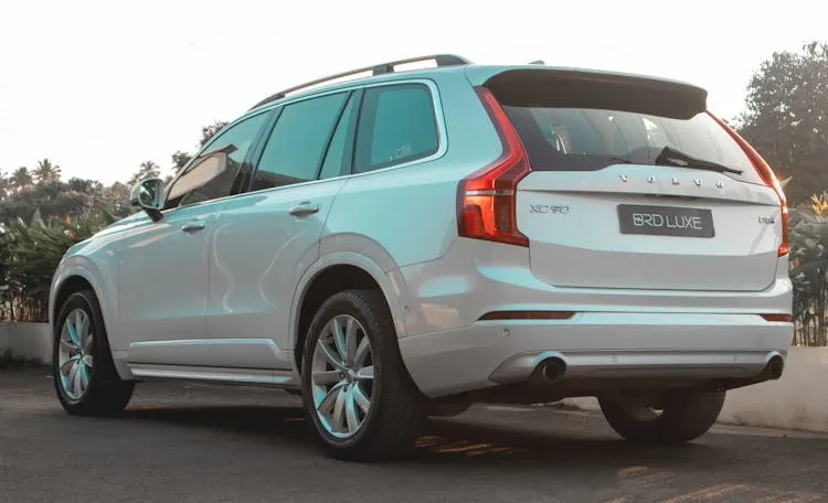 A luxurious used Mercedes-Benz GLK SUV is parked, emphasizing its upscale design and practical features.