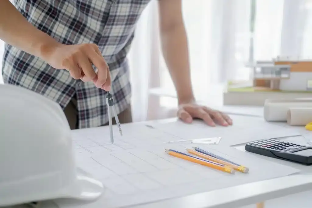 Architect or engineer working in office