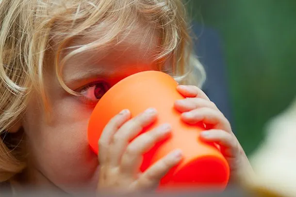 Child drinking from a bottle