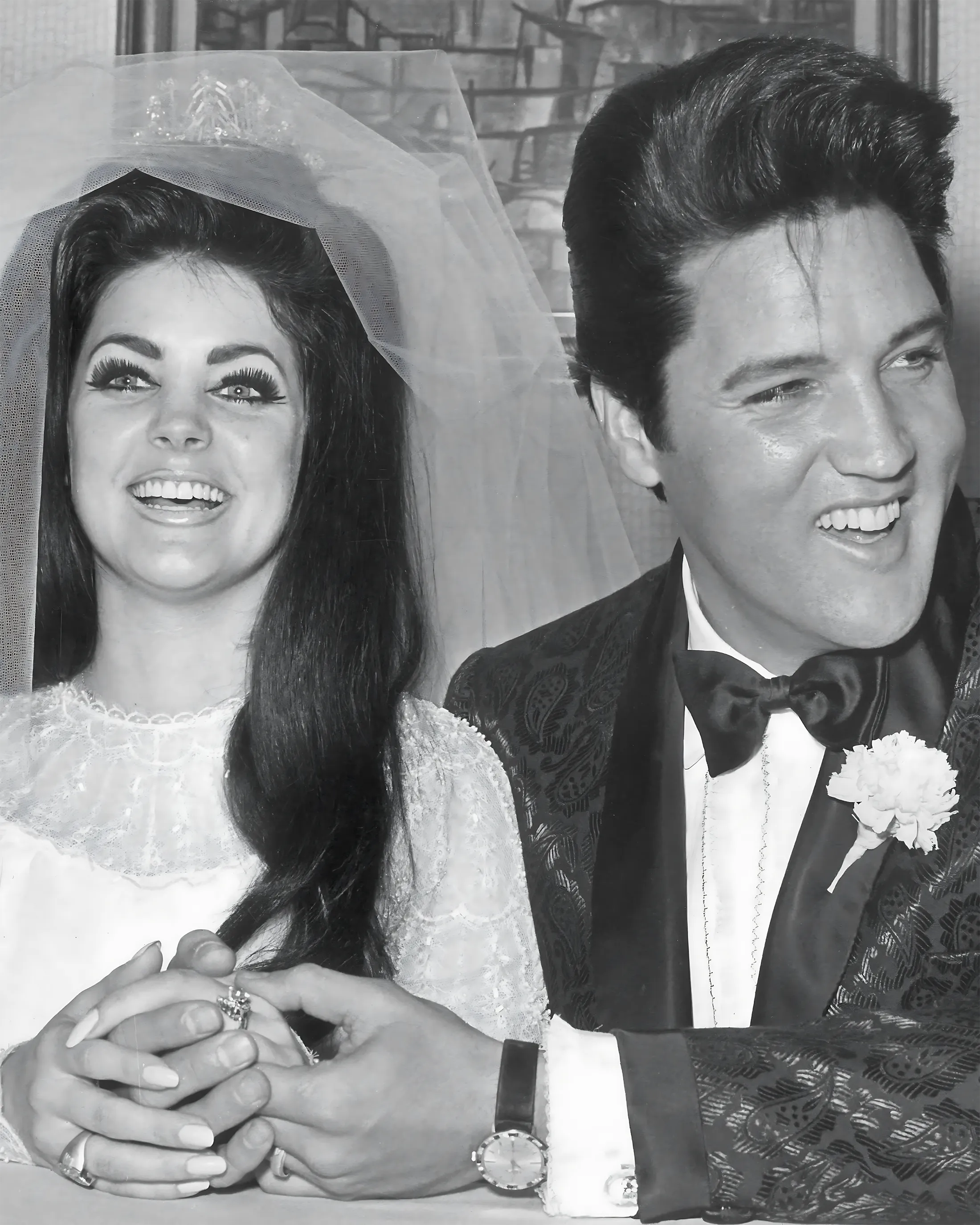 Elvis and Priscilla Presley share sweet kisses on their wedding day in Las Vegas on May 1, 1967.