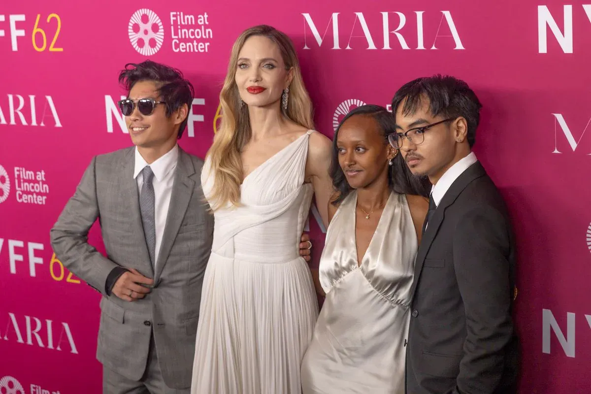 Pax Thien Jolie, Angelina Jolie, Zahara Marley Jolie, and Maddox Chivan Jolie attend the