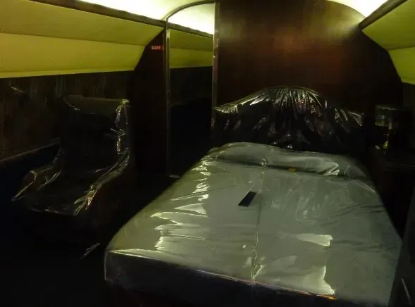 The master bedroom aboard the Lisa Marie jet, designed for ultimate comfort.