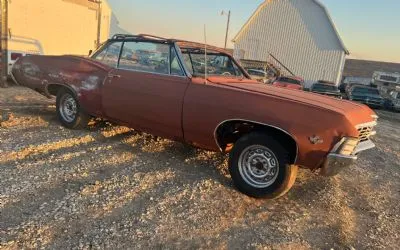 1967 Chevrolet Impala SS Convertible body shell for restoration, showing the distinctive drop-top profile
