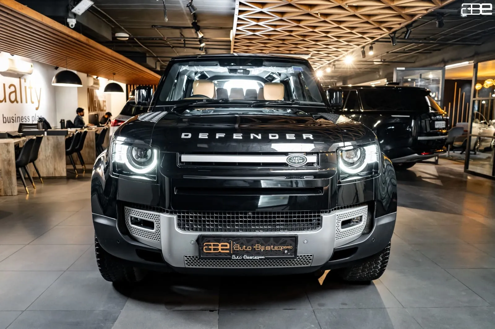 The distinctive front grille of a Land Rover Defender 110 HSE, emphasizing its rugged yet luxurious design language