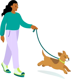 A woman walking a dog