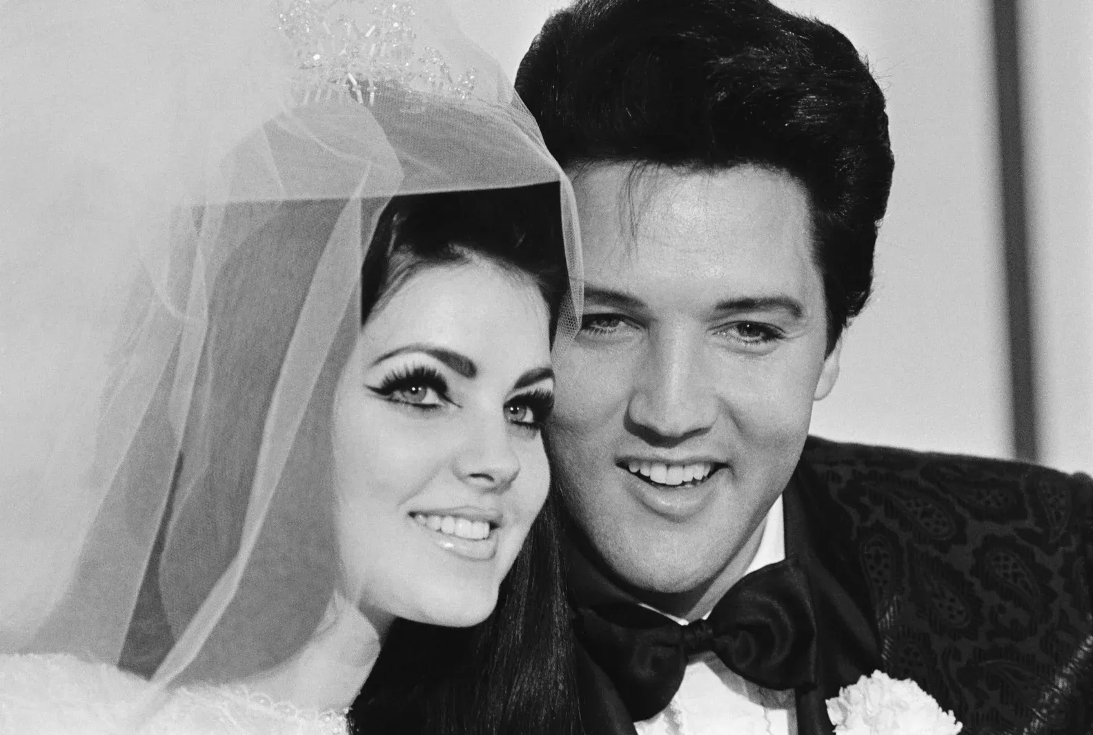 Priscilla Presley and Elvis Presley, a couple whose relationship spanned over a decade and produced one child.