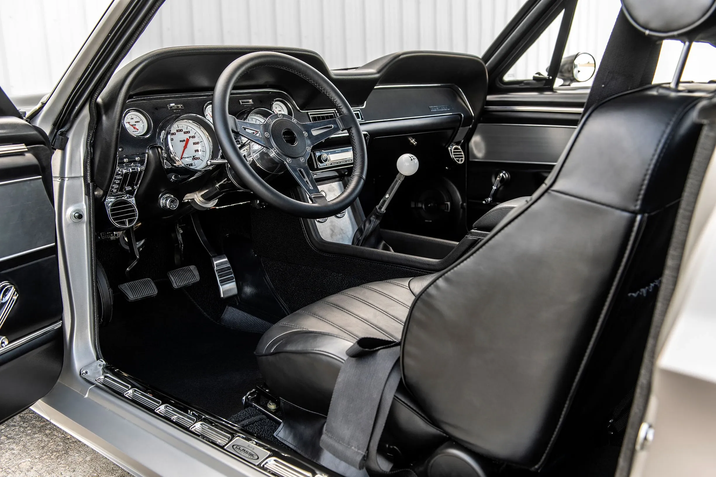 Rear three-quarter view of the Classic Recreations 1968 Ford Mustang Villain