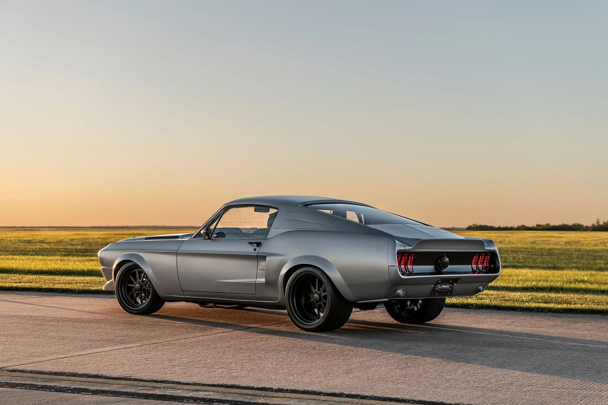 Close-up view of the carbon fiber accents and aggressive front splitter on the Mustang Villain