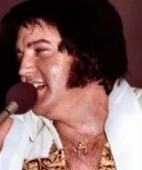 Elvis Presley wearing a Chai pendant