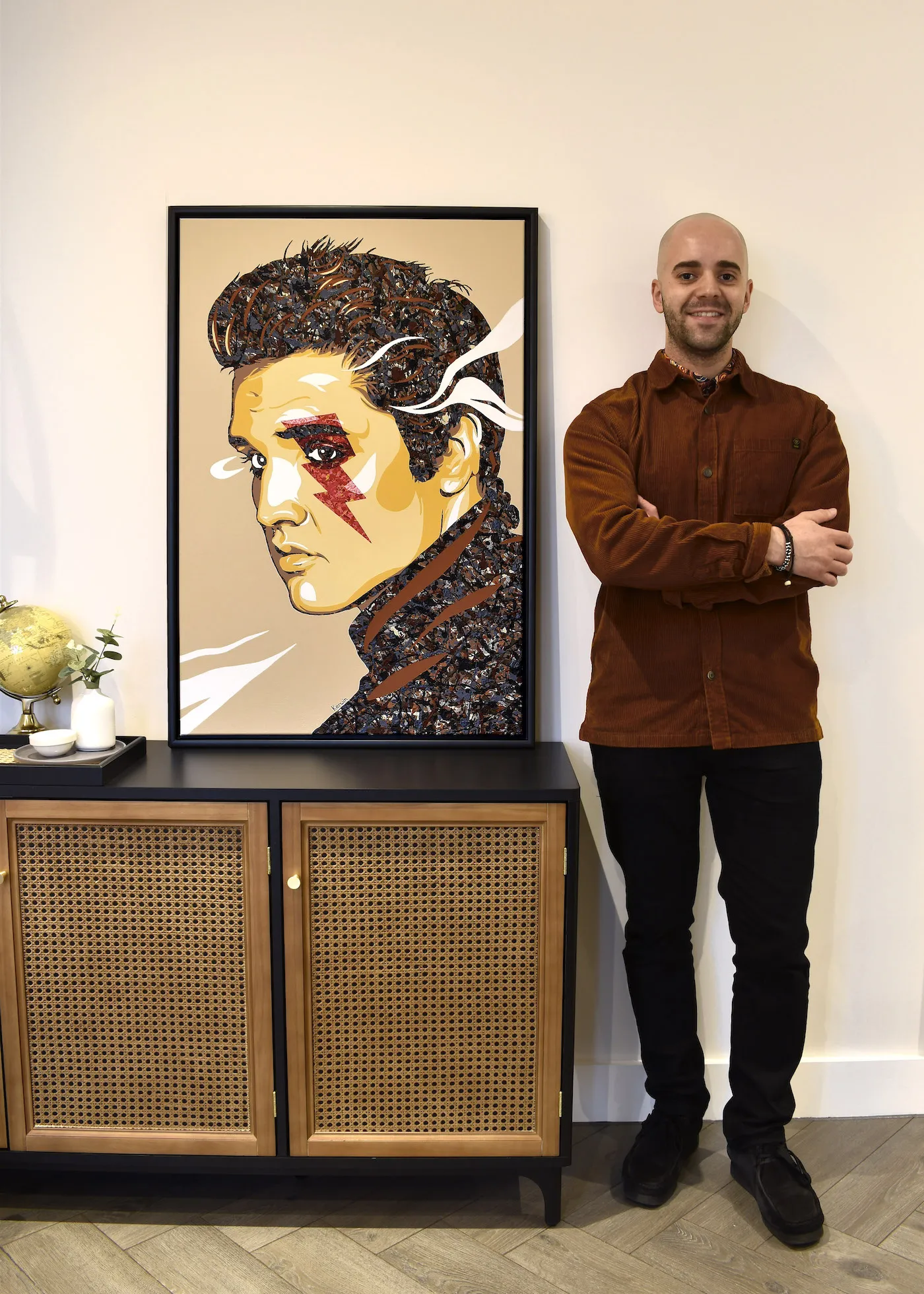 Elvis Presley pop art portrait painting in Jackson Pollock style by UK artist Kerwin Blackburn featuring TCB lightning bolt