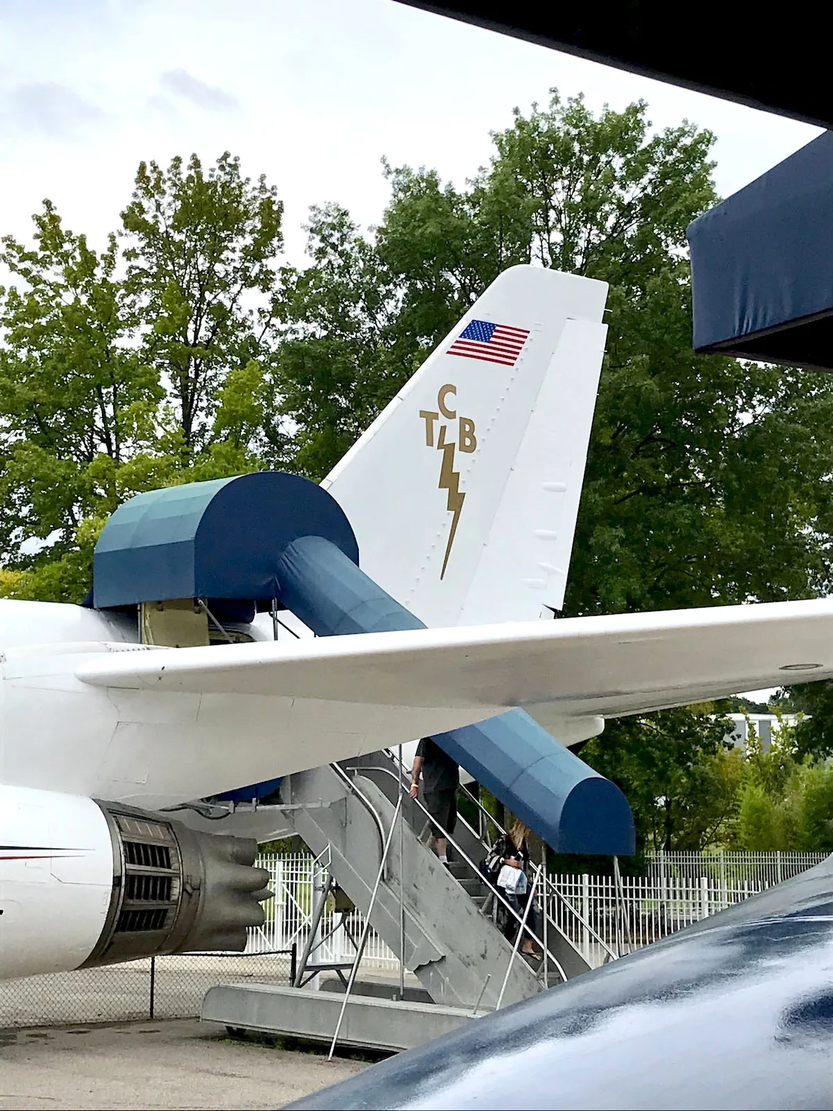 Elvis Presley's private aircraft at Graceland featuring the TCB lightning bolt logo on the fuselage