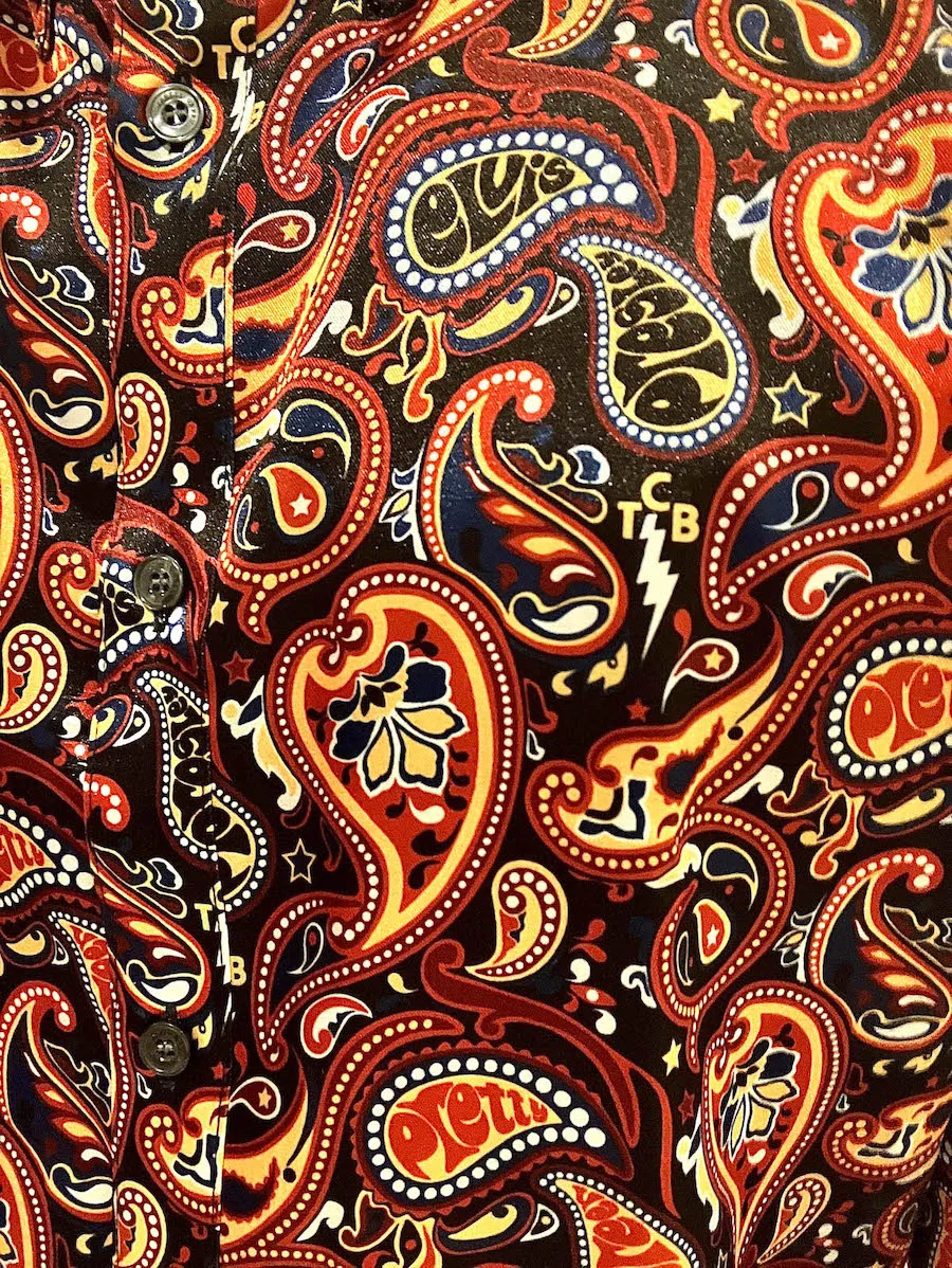 Pretty Green x Elvis Presley collaboration paisley shirt featuring TCB lightning bolt design in red black and gold