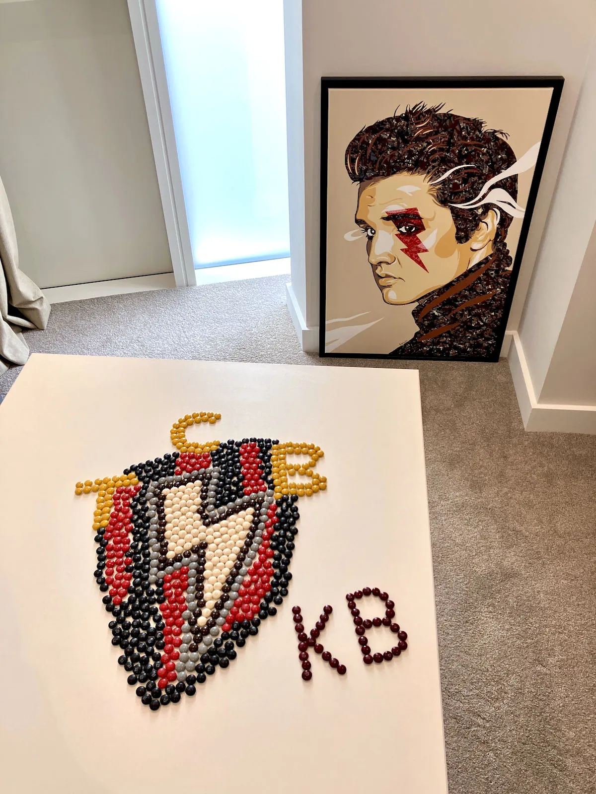 Full overhead view of the completed Elvis TCB M&M chocolate mosaic by artist Kerwin Blackburn