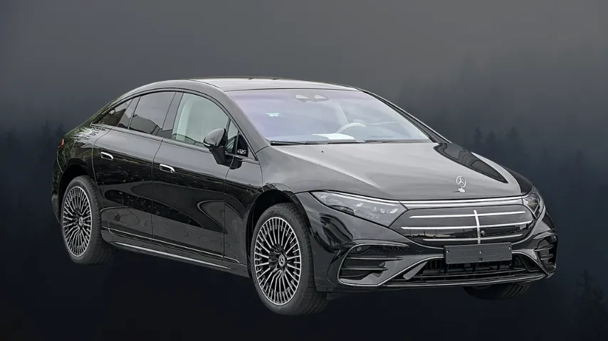 The 2024 facelifted Mercedes-Benz EQS in white, displaying its flowing fastback silhouette and updated front fascia