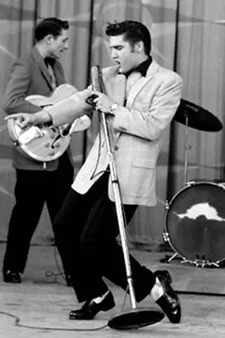 Elvis Presley performing on the Milton Berle Show, a performance that sparked nationwide controversy and captivated youth
