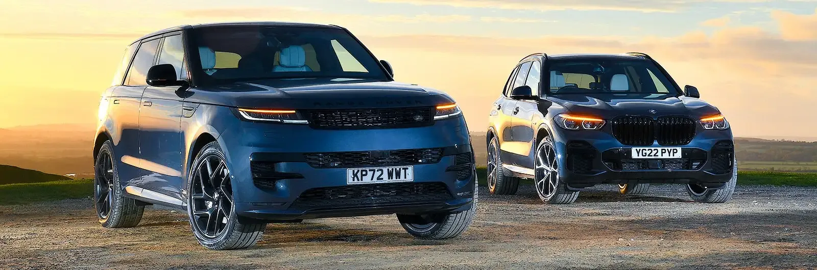 Comparison shot of a Range Rover Sport and a BMW X5, representing the luxury SUV segment.