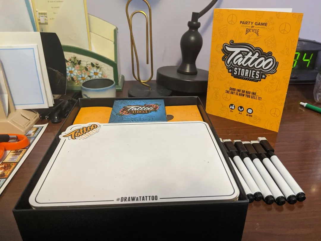 The contents of the Tattoo Stories board game