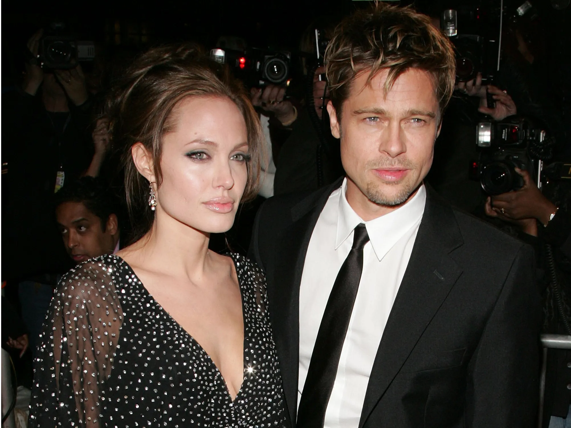 Angelina Jolie and Brad Pitt traveling internationally