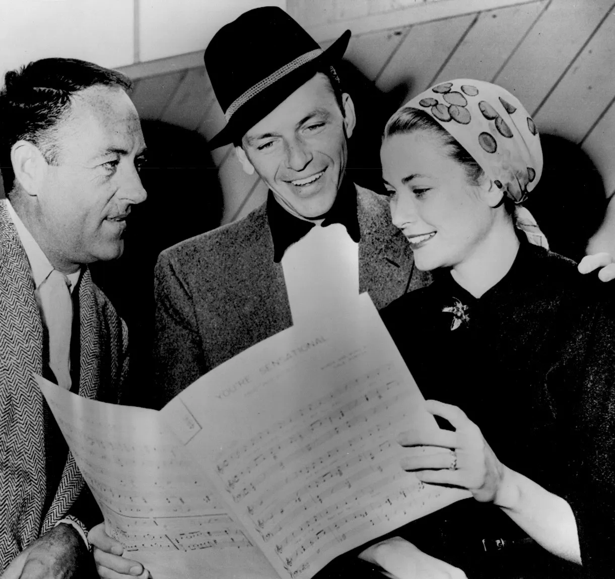 Director Charles Walters working with Frank Sinatra and Grace Kelly