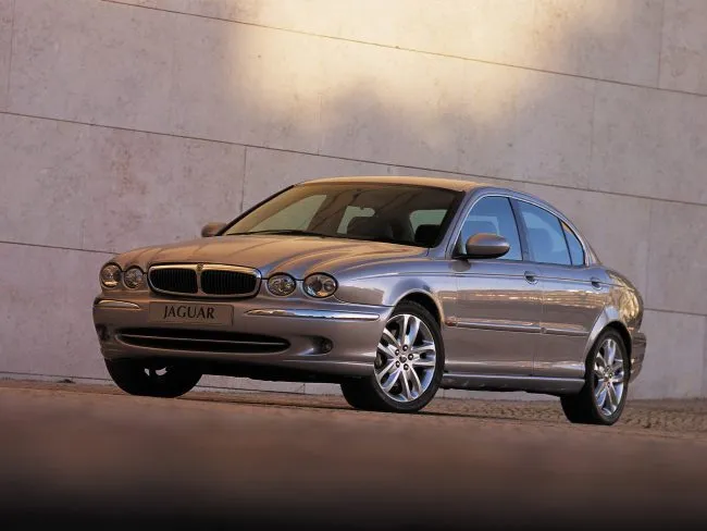 Jaguar X-Type on a scenic countryside road