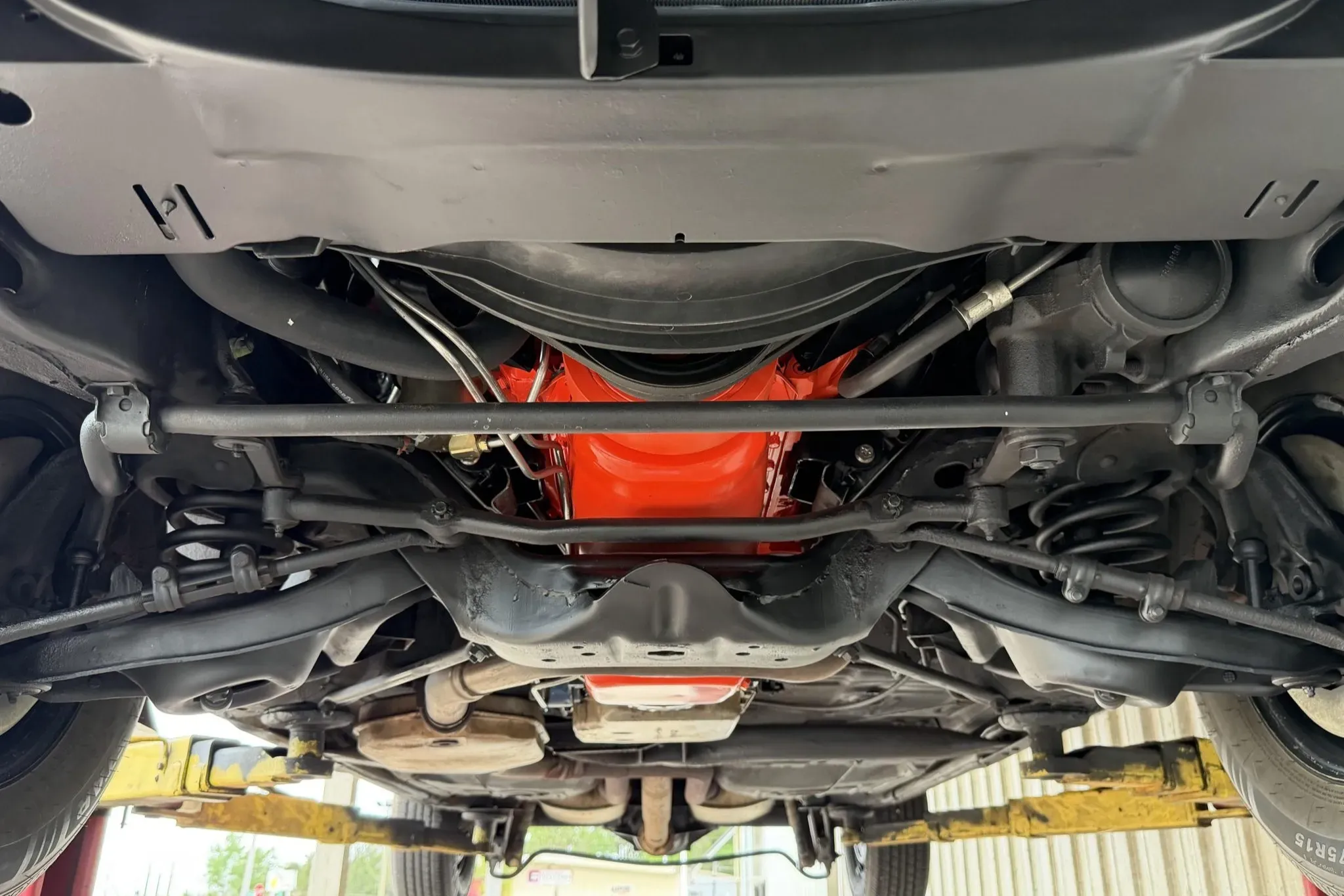 454ci V8 engine bay of 1975 Chevrolet Caprice Classic showing carburetor and detailed presentation
