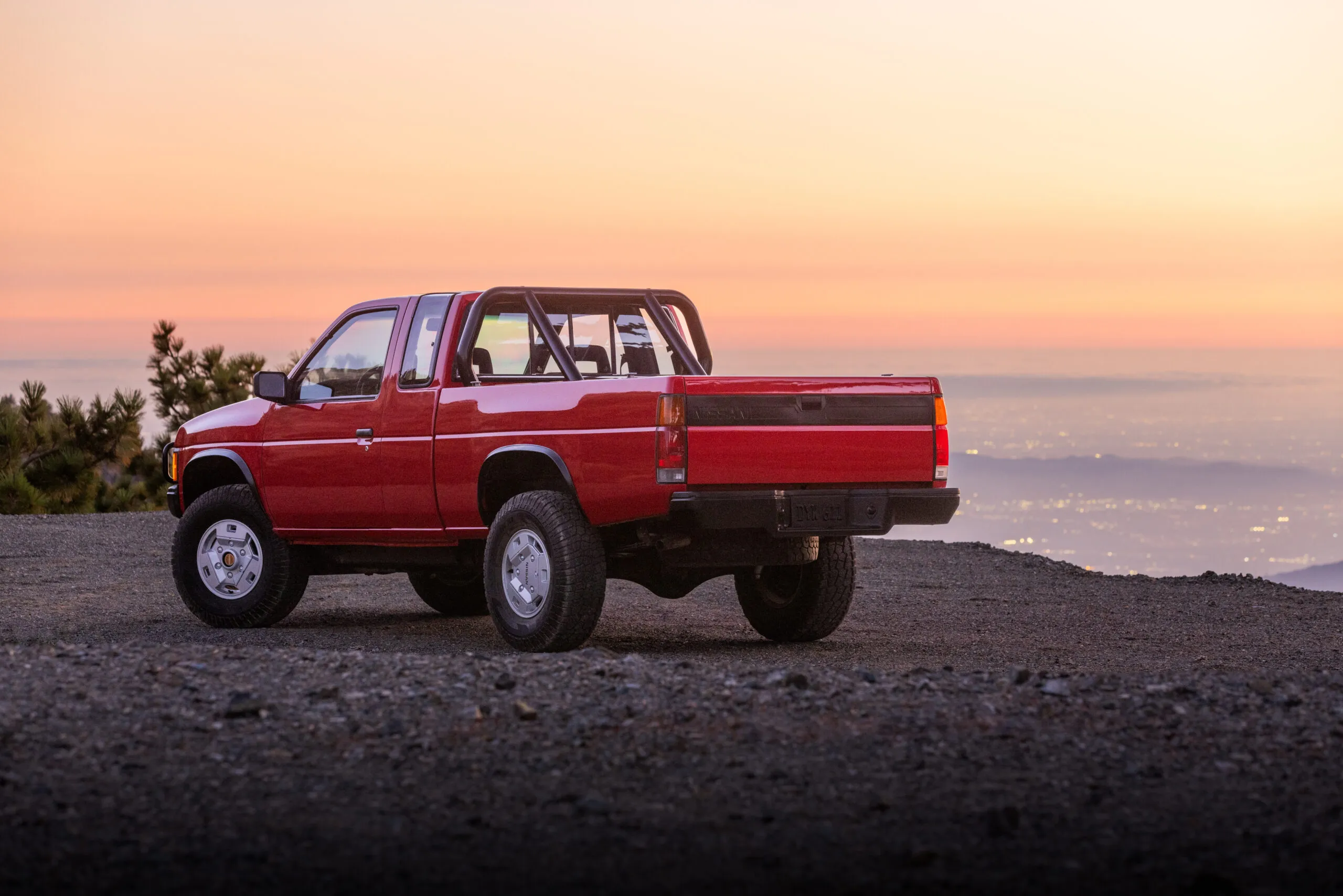 Vintage Nissan Frontier Hardbody truck with a rugged design