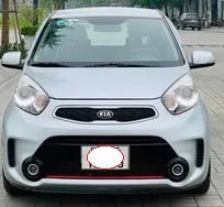Kia Morning 2018 compact city car in showroom lighting