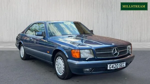 Mercedes-Benz 420 SEC classic coupe parked in studio lighting