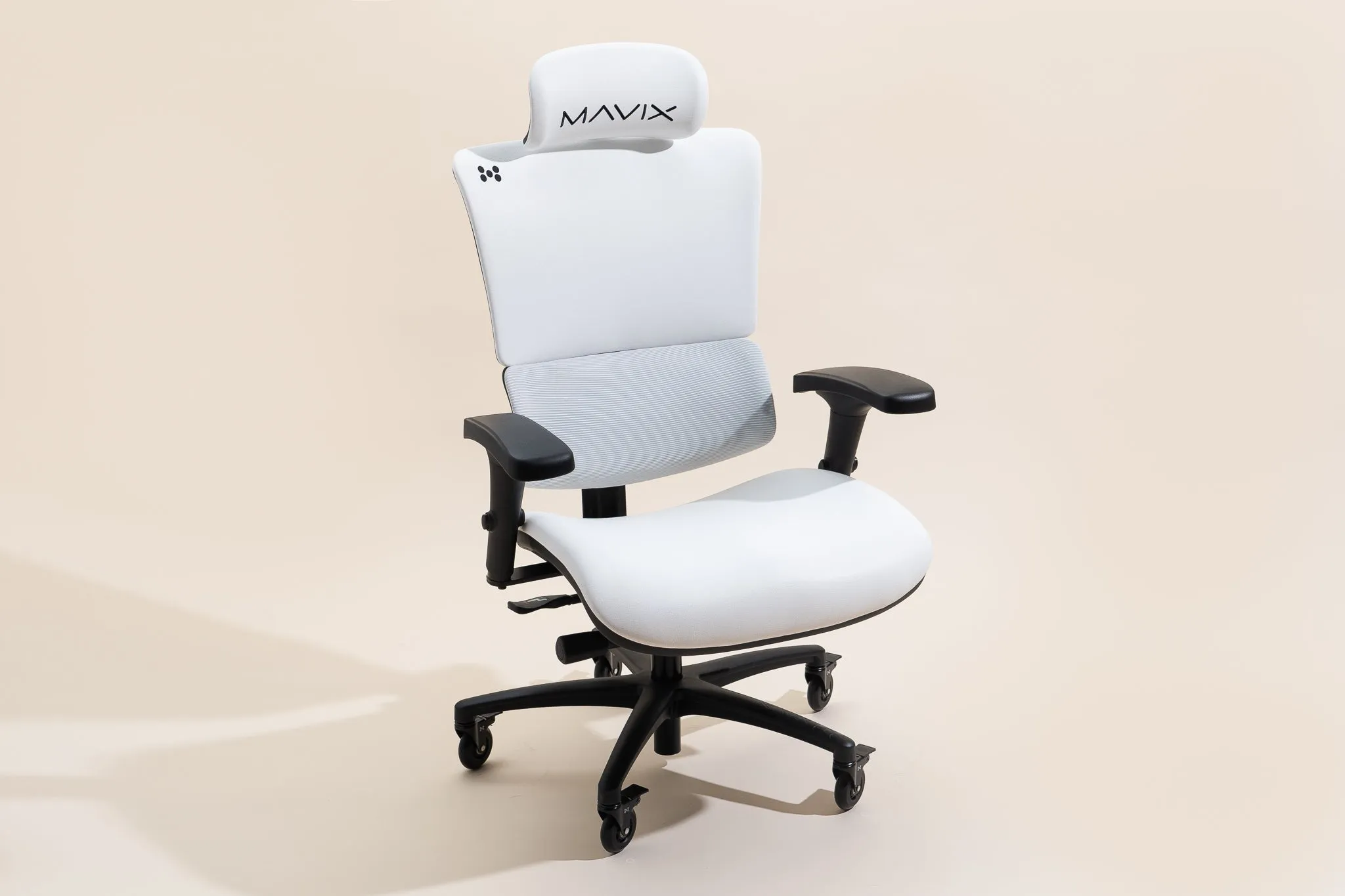 White Mavix M9 gaming chair with adjustable headrest and spacious seat