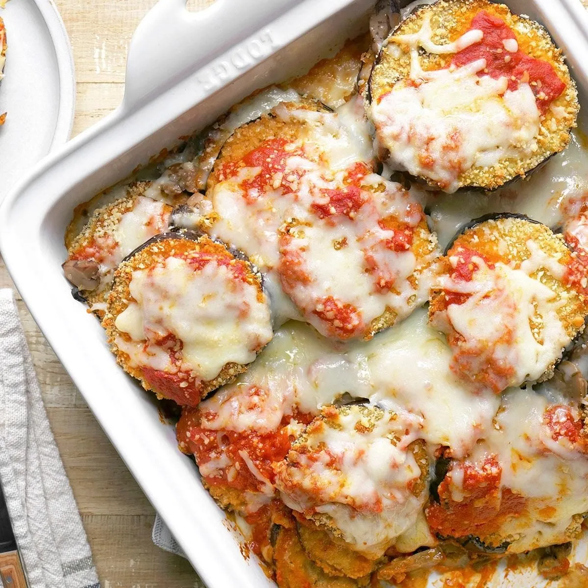 Baked eggplant parmesan with tomato sauce and cheese