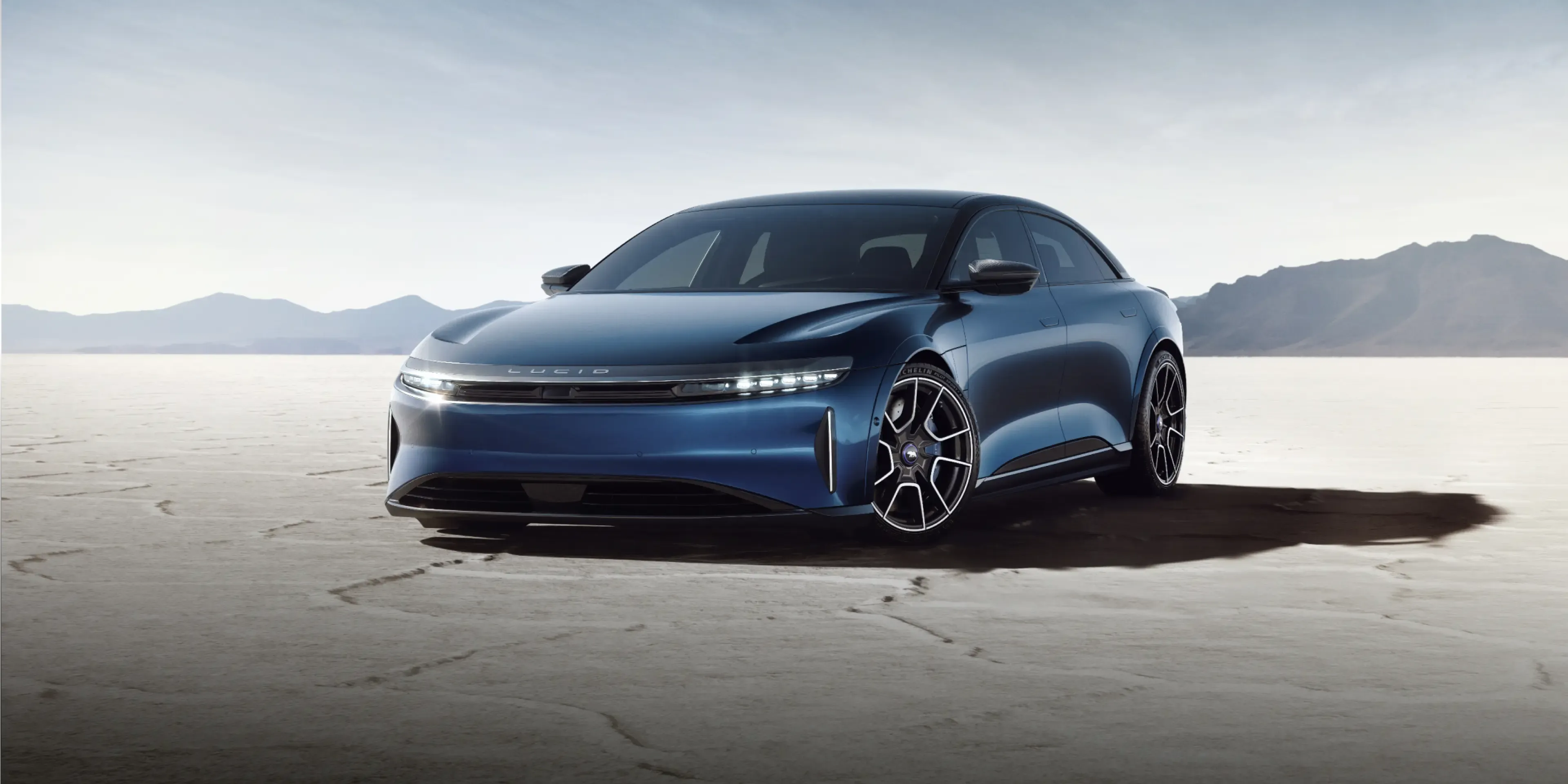 The Lucid Air Sapphire in motion, showcasing its sleek aerodynamic design and powerful stance