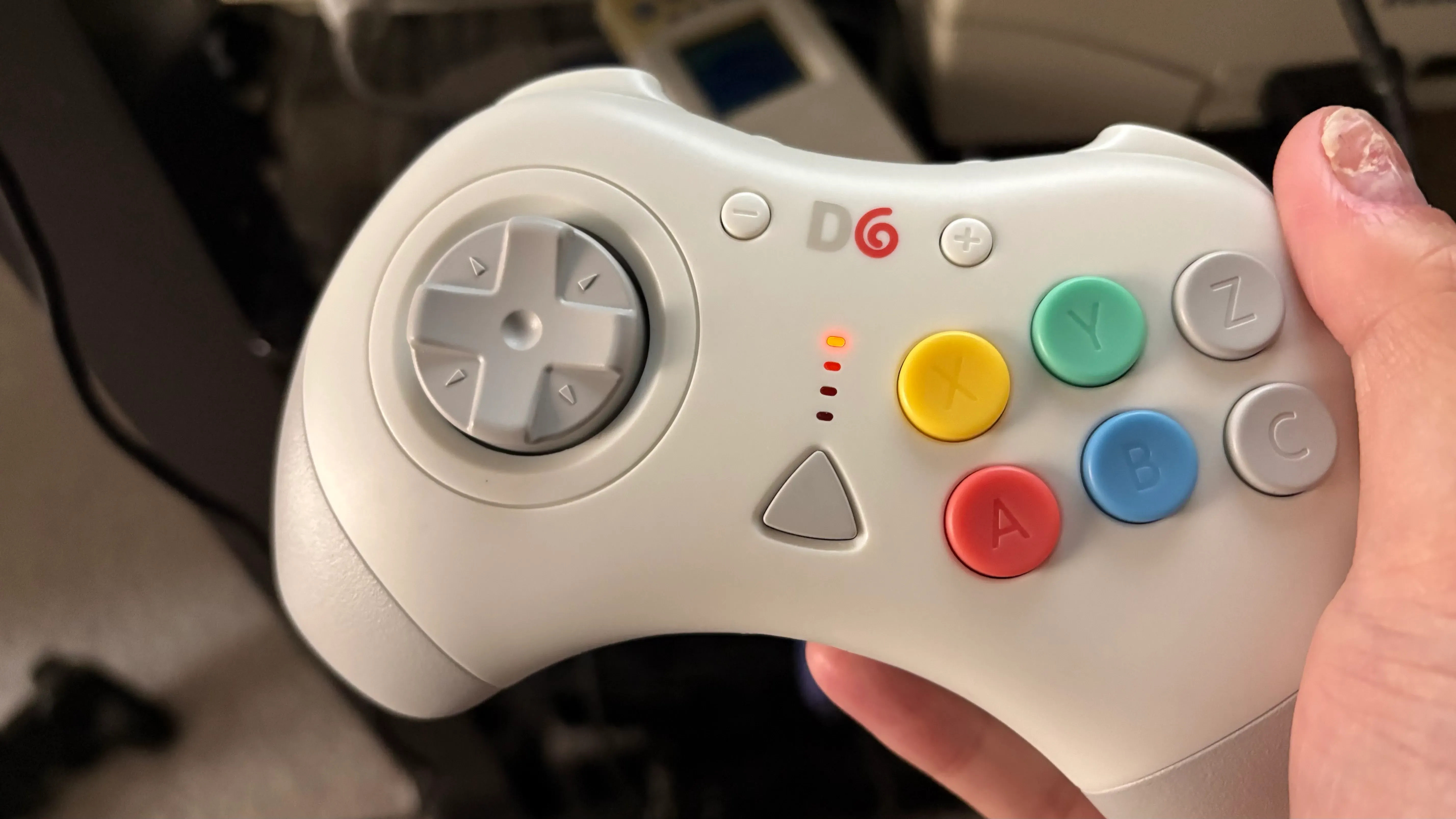 Dreamcast-inspired wireless controller with six-button layout