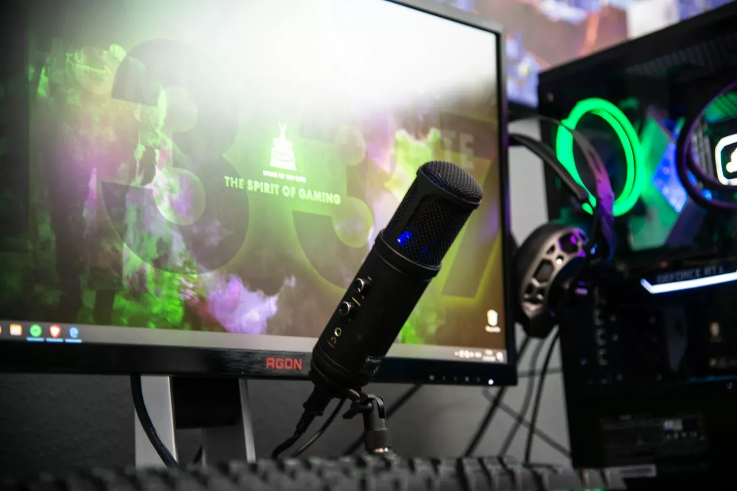 Streaming setup with microphone and monitor for gaming content creation