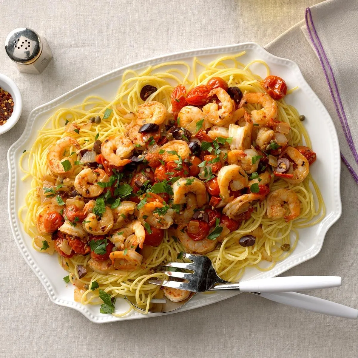 Shrimp Puttanesca with spaghetti