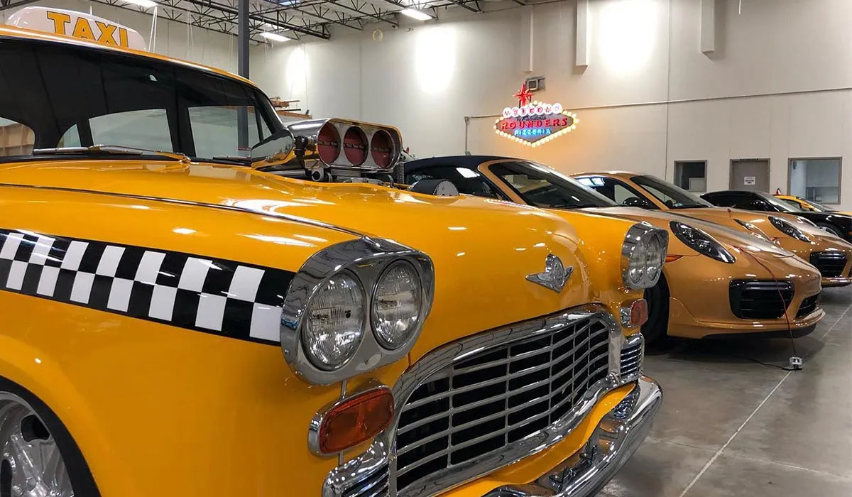 Austin classic car museum exhibit featuring historic race cars and music memorabilia