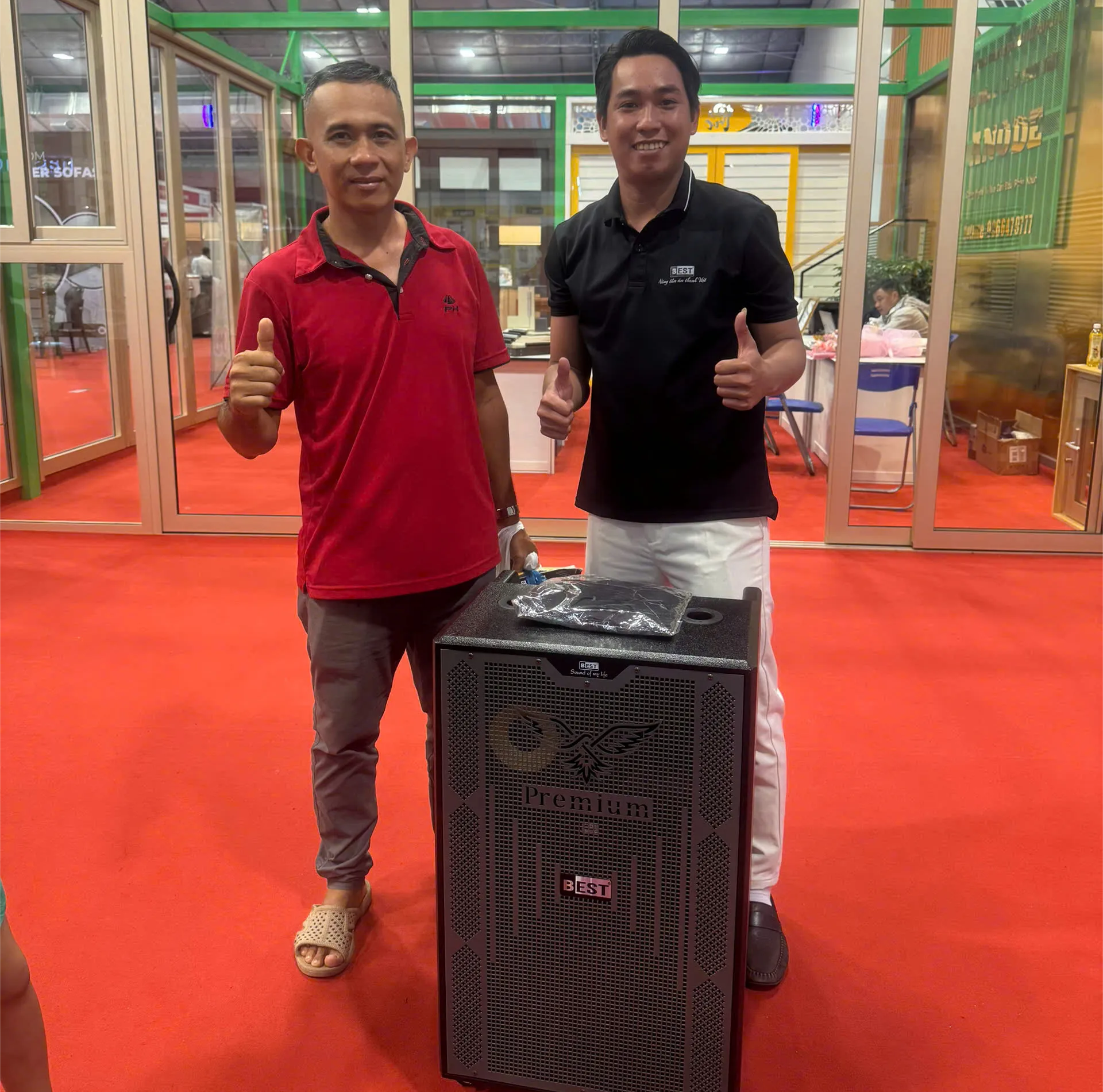Customer using BestAudio portable speaker system in real-life karaoke setup