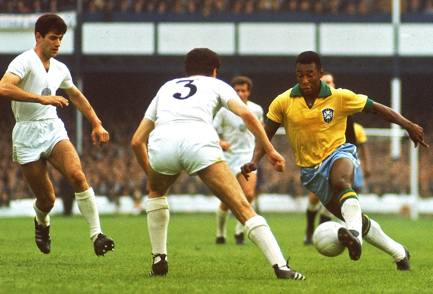 Pelé during the 1966 World Cup, surrounded by intense defensive pressure