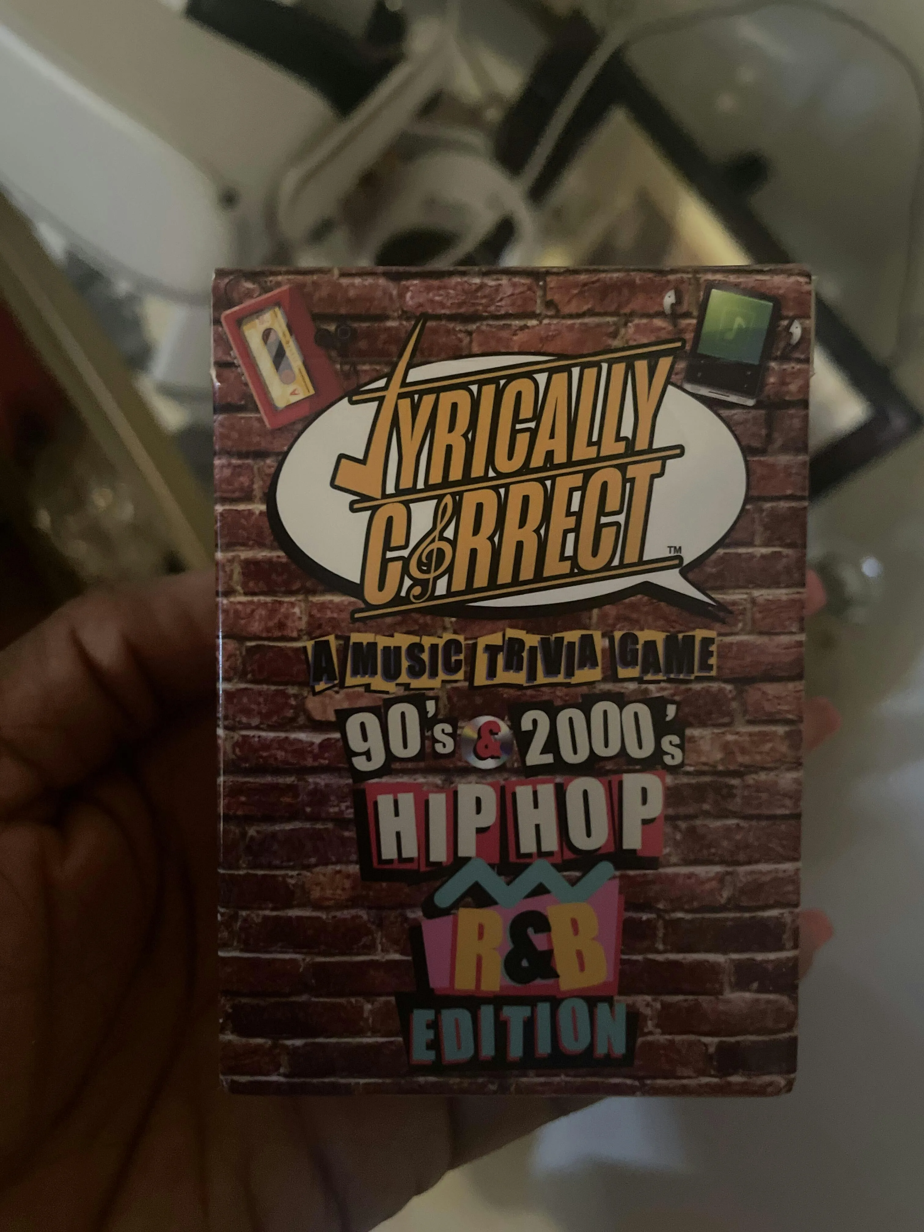 Players reviewing reaction images and testimonials from the Oldies music card game experience
