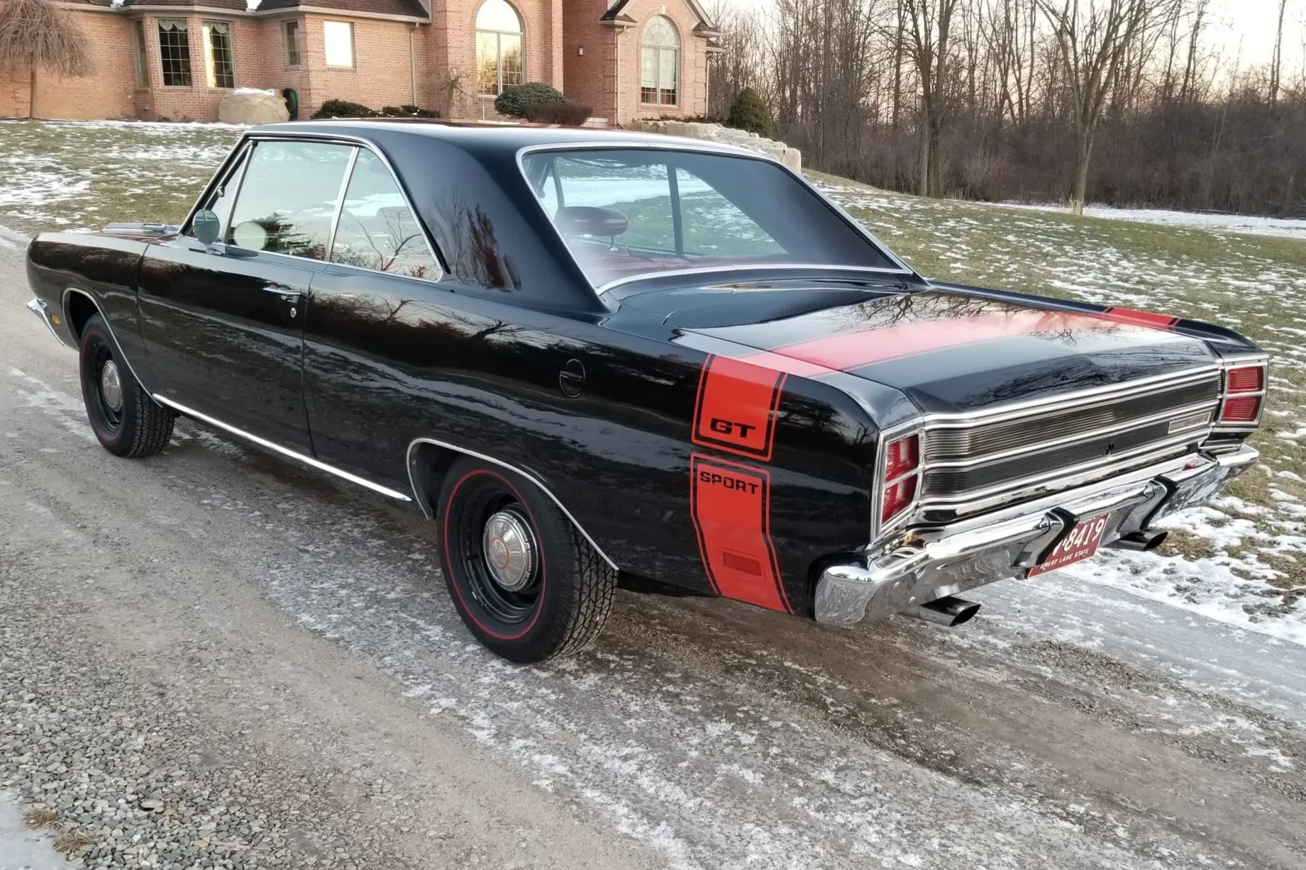 Black 1969 Dodge Dart GTS 440 hardtop coupe with Rumblebee tail stripe