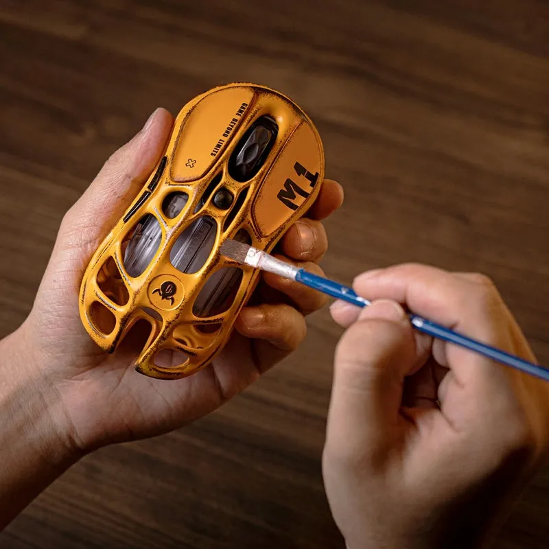 Battle-worn magnesium alloy gaming mouse frame
