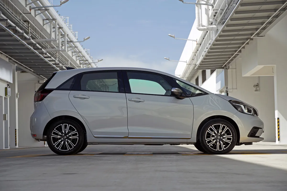 Front three-quarter view of the 2021 Honda Jazz e:HEV showing compact proportions and friendly styling