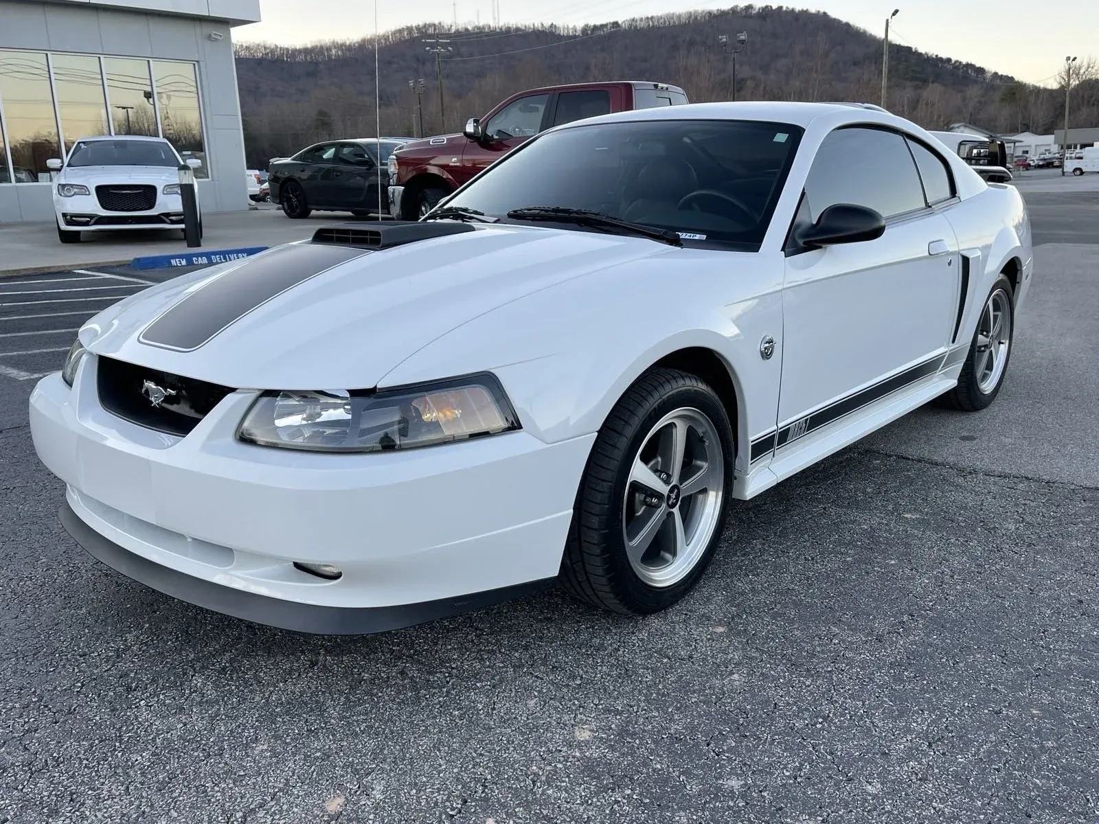 The 2004 Mustang Mach 1 with its matte black hood stripe and Mach 1 badging