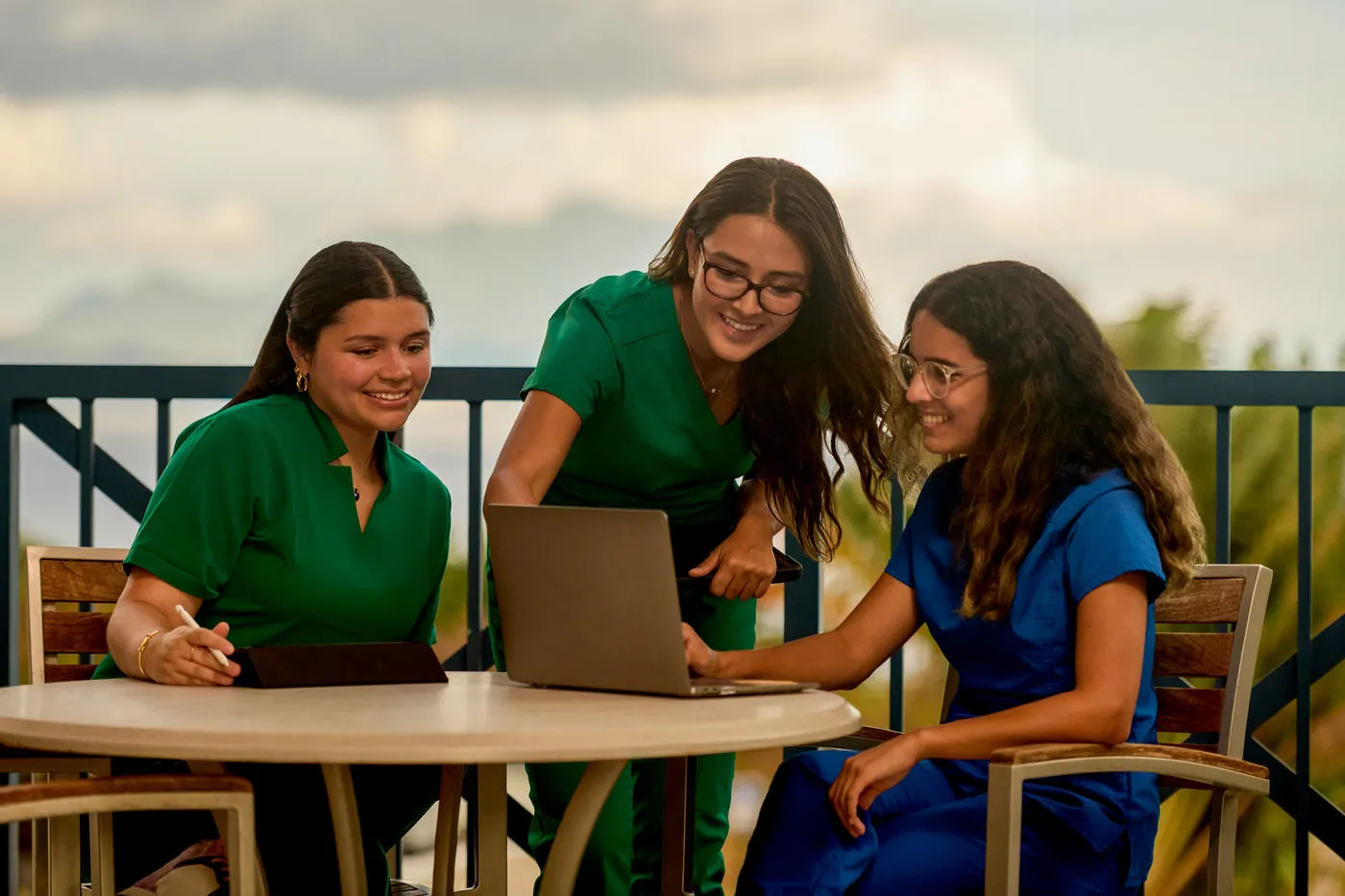 Veterinary students researching animal health information together